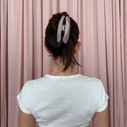 model wearing Half Moon Clip in Pink Smoke in hair