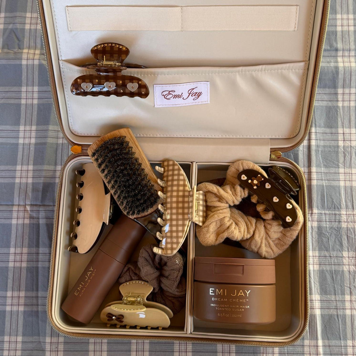 On The Way Vanity Case in Toasted Sugar with assorted emi jay hair care and accessories