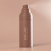Aura Hair + Body Mist™ in Toasted Sugar spraying mist