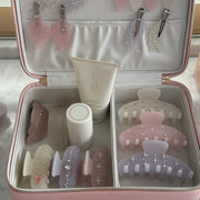 assorted emi jay hair care and accessories in vanity case