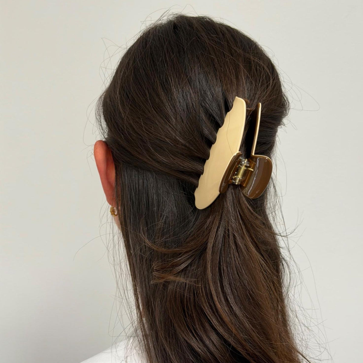 model wearing Big Effing Clip in Milk and Cookies in hair