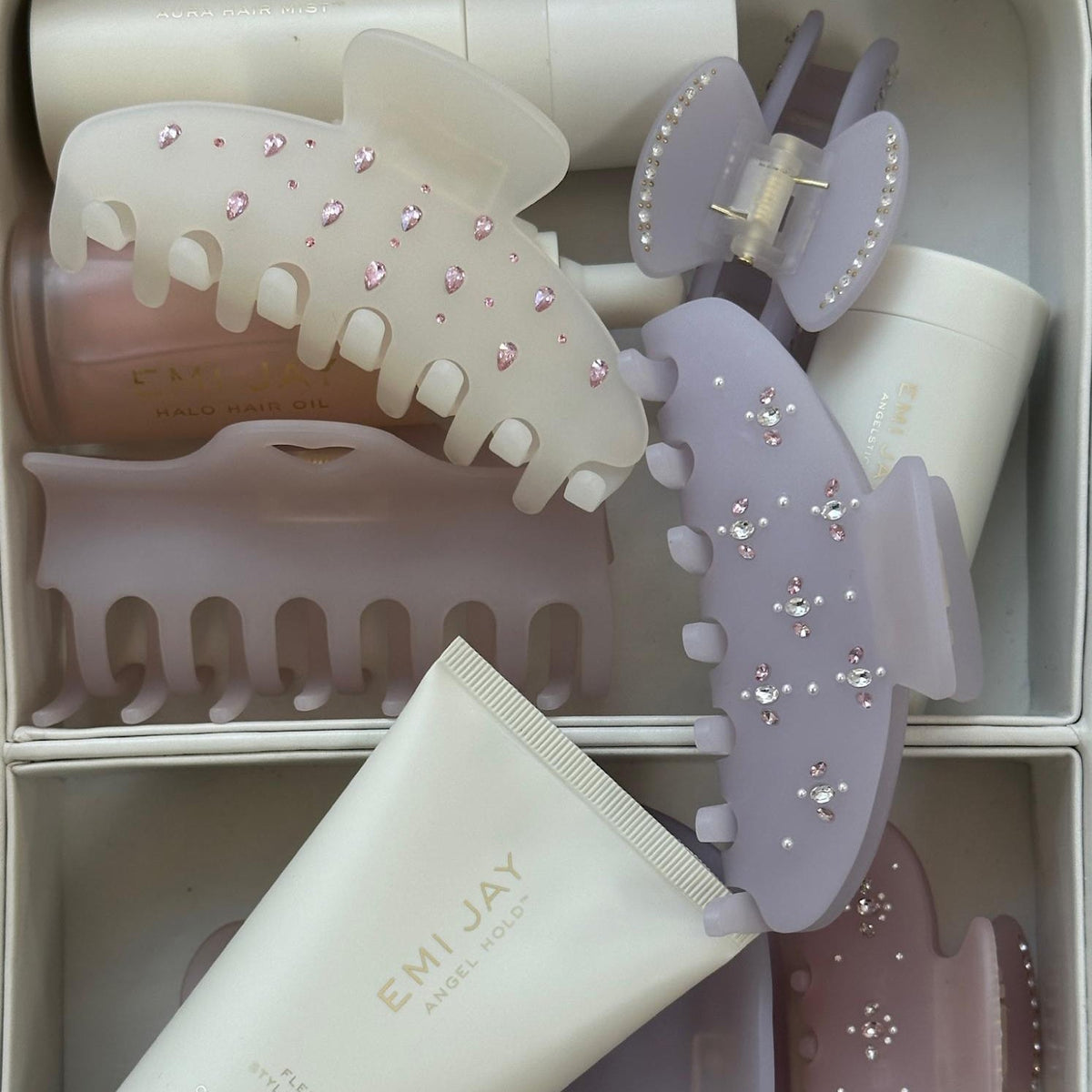 assorted emi jay hair care and accessories in vanity case