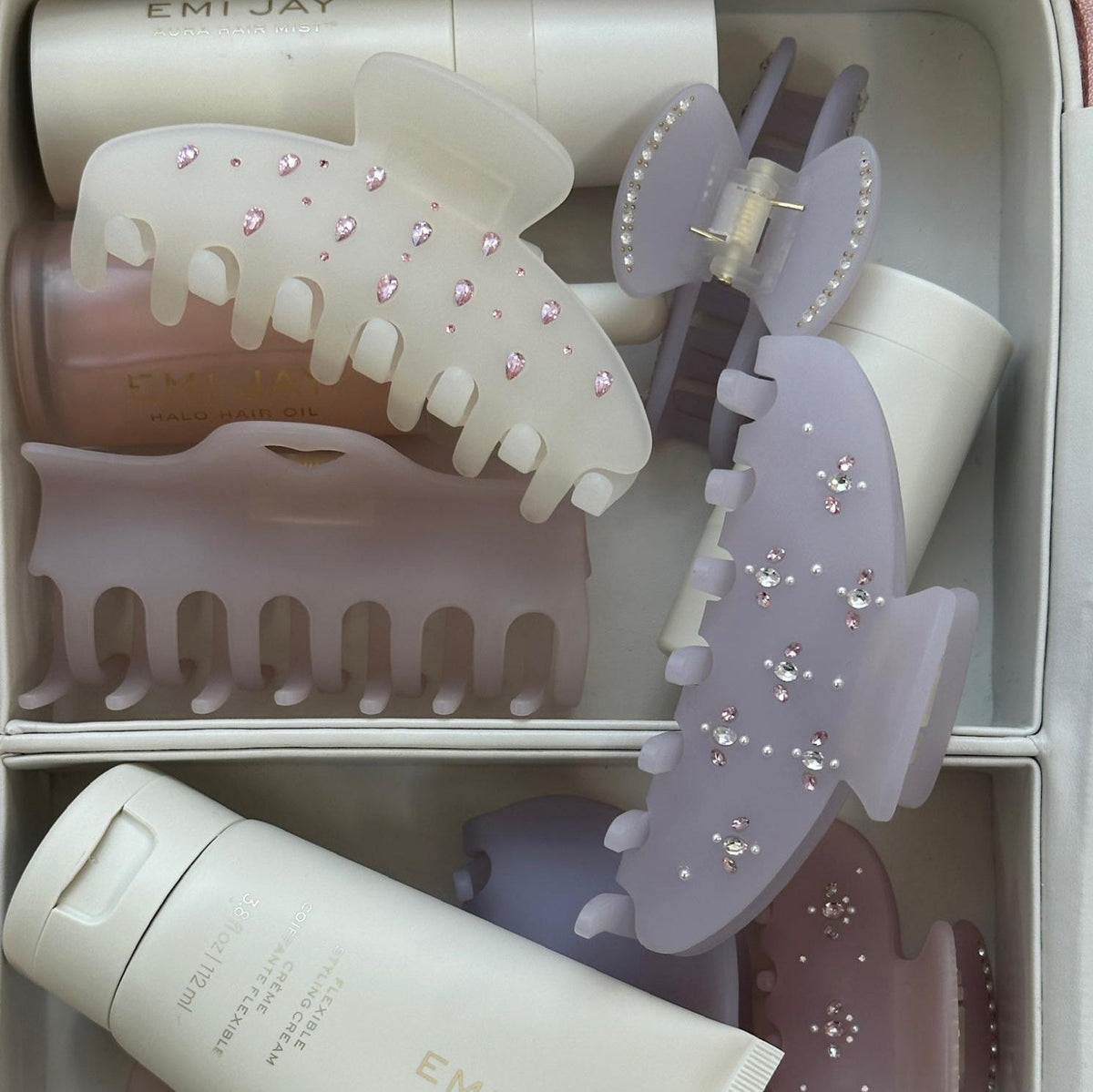 assorted emi jay hair care and accessories in vanity case