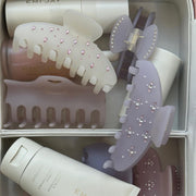 assorted emi jay hair care and accessories in vanity case