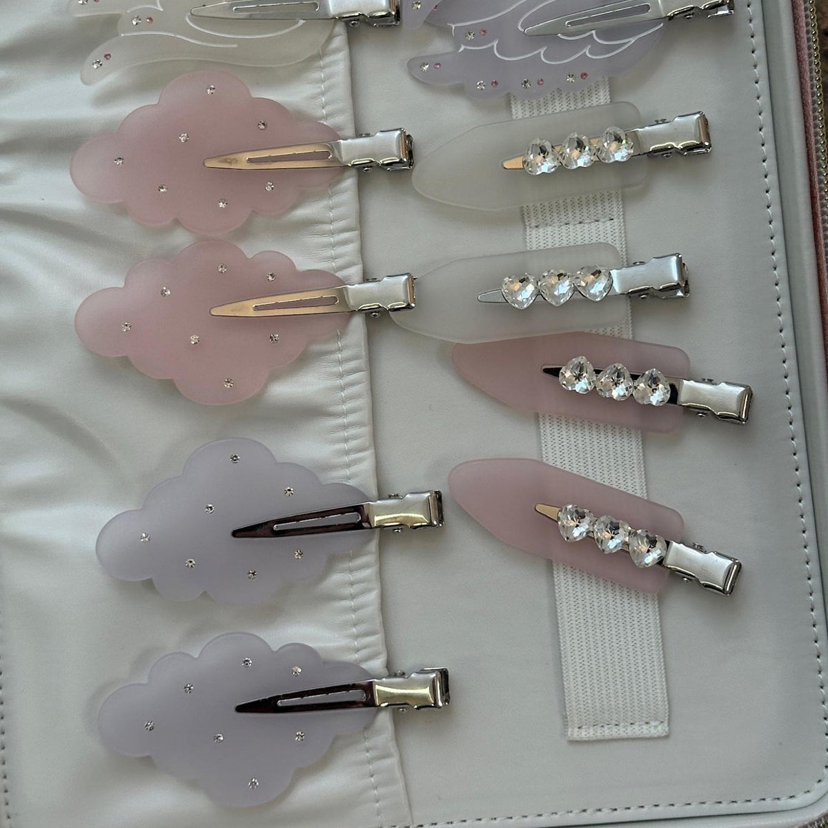 assorted emi jay popstar hair clip attached to vanity case