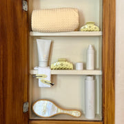 Lil Effing Clip in Citrine Petal Eyelet on shelf next assorted emi jay hair care and accessories