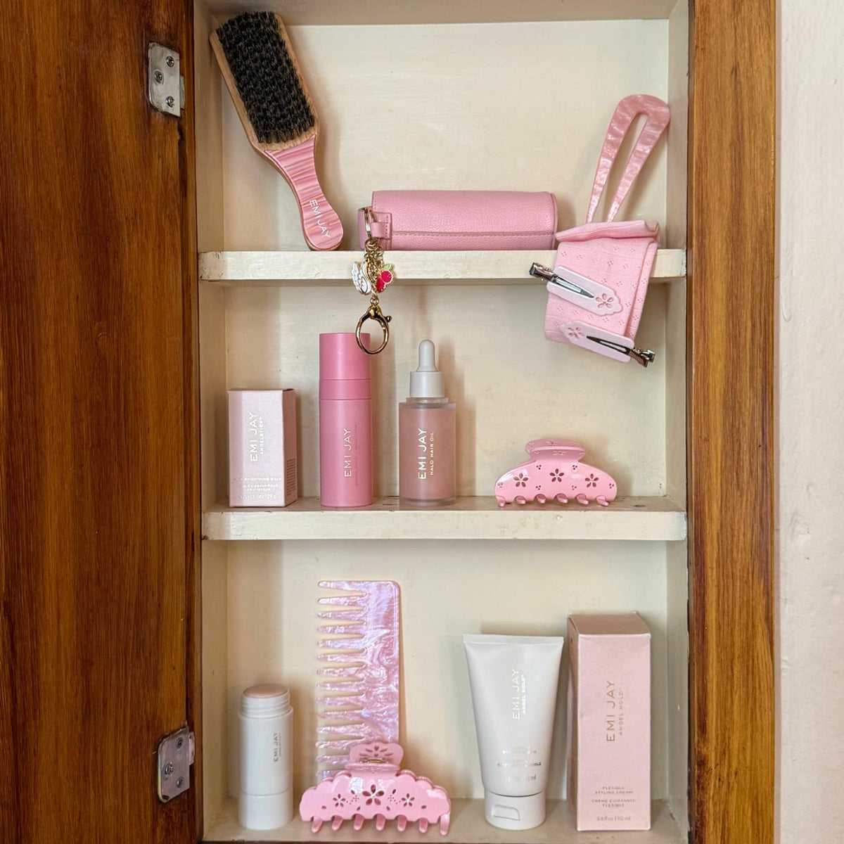 Lil Effing Clip in Rose Petal Eyelet on shelf with assorted emi jay hair care and accessories