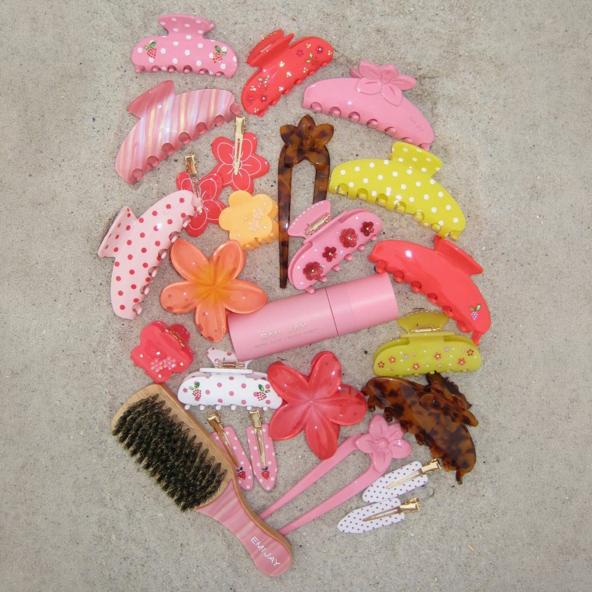 aura hair + body mist in lychee baby with assorted emi jay hair accessories and brush