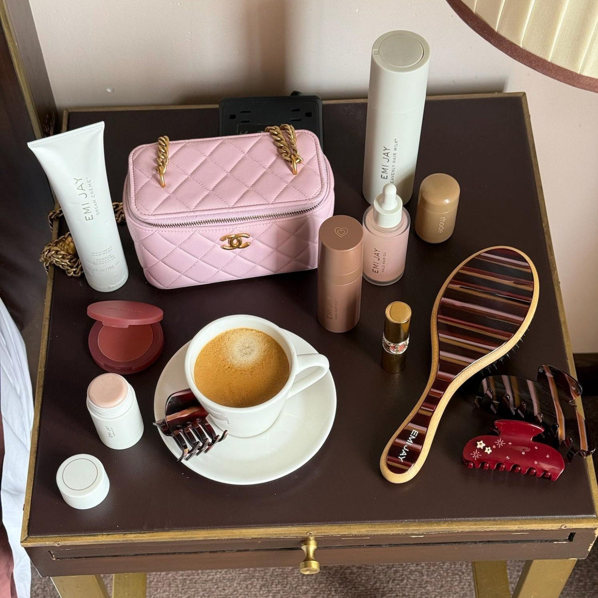 assorted emi jay hair care and accessories on table with coffee