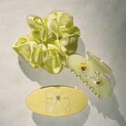 Sweet Dreams Silk Scrunchie in Dandelion with assorted hair accessories