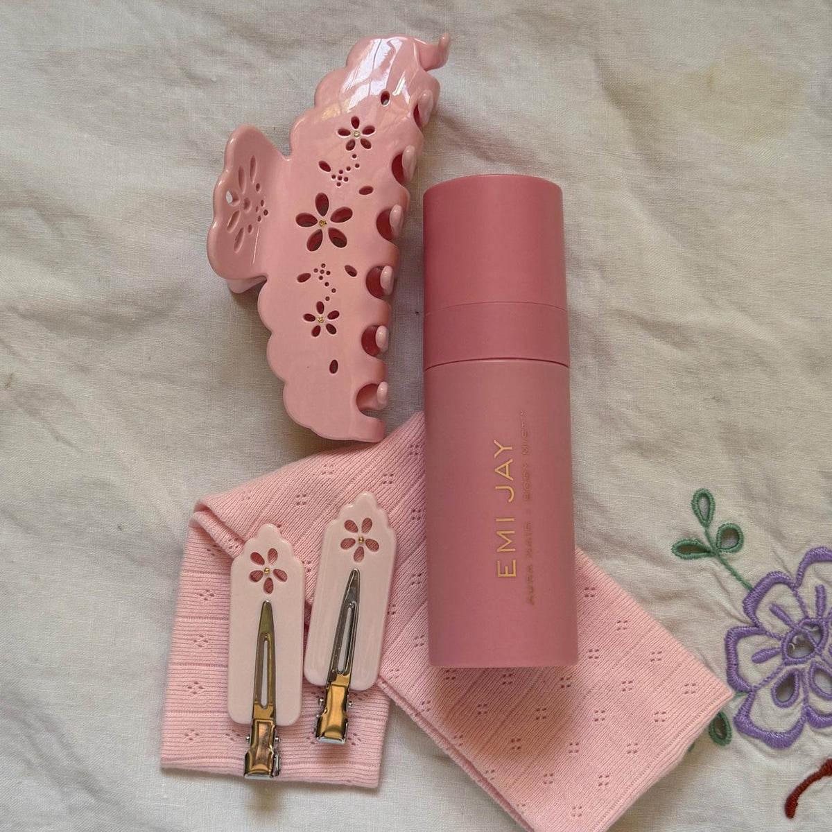 Popstar Clips in Sunrise Blush Eyelet with aura mist, big effing clip, and headband
