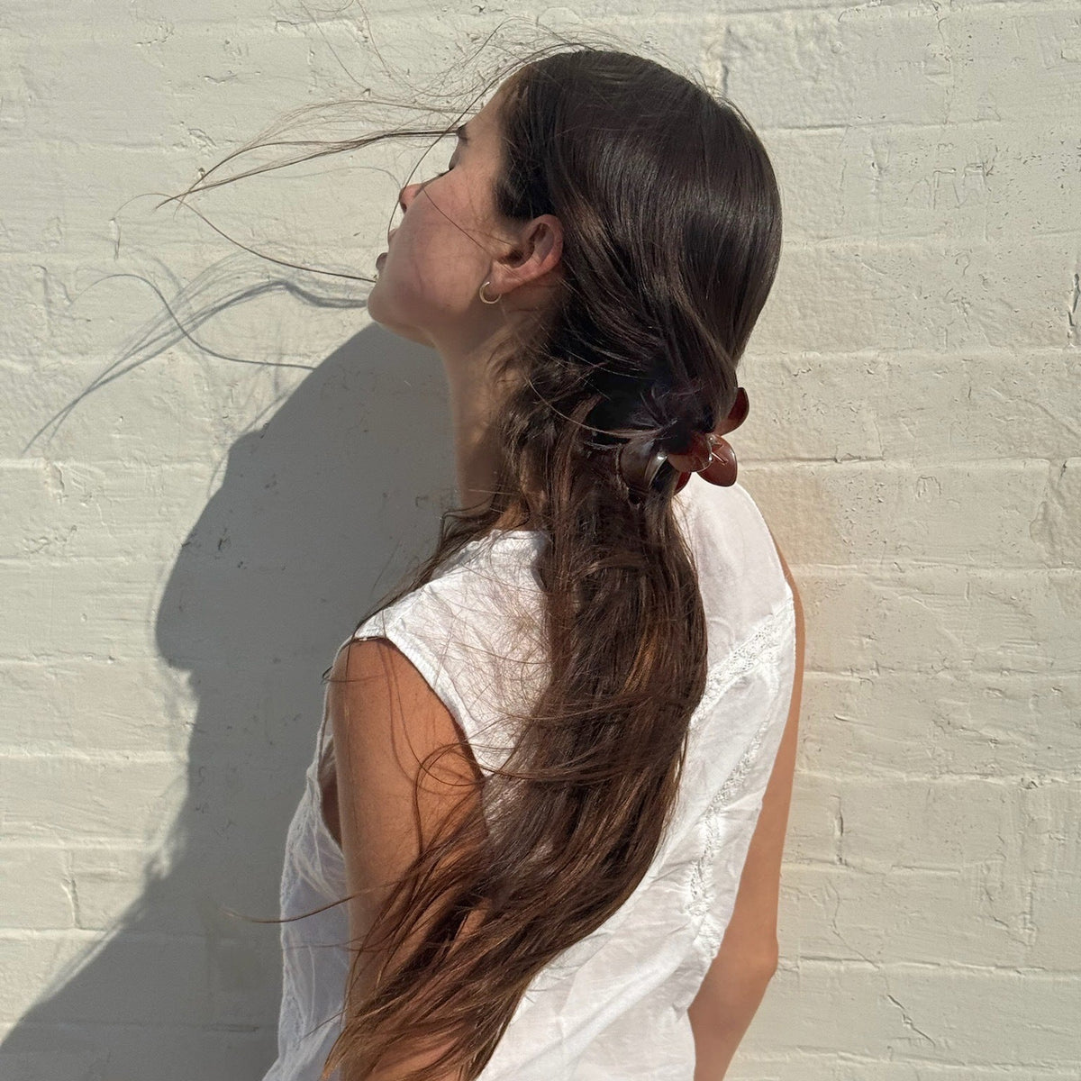 model wearing Super Bloom Clip in Tamarind in hair